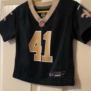Nike Kids Black and Gold Jersey